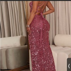 I'm selling this beauty gown/ dress it's pink and it's so sparkly its beautiful